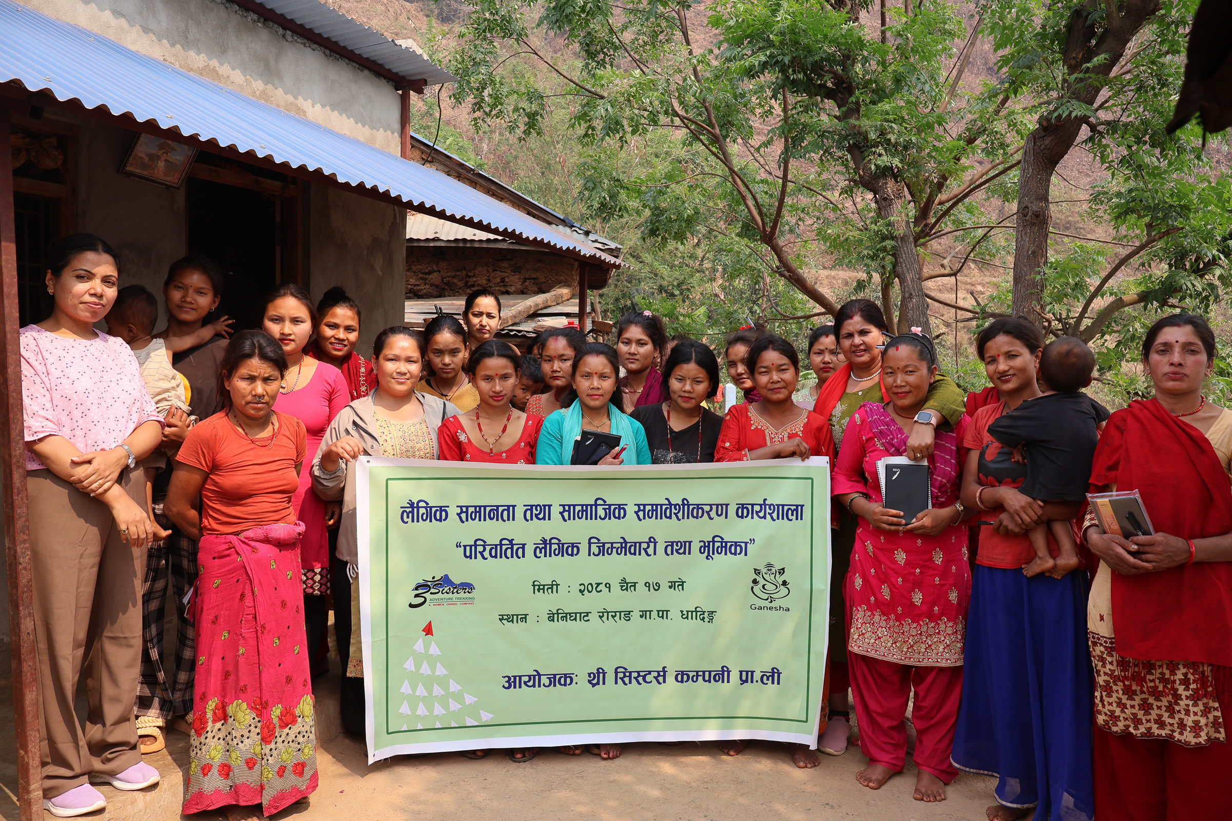 Group of Chepang women attending the first GESI workshop in Mathilo Orbang, Nepal, holding a banner about gender equality and social inclusion training, organised by the Three Sisters with support from Global Solutions’ GANESHA project.