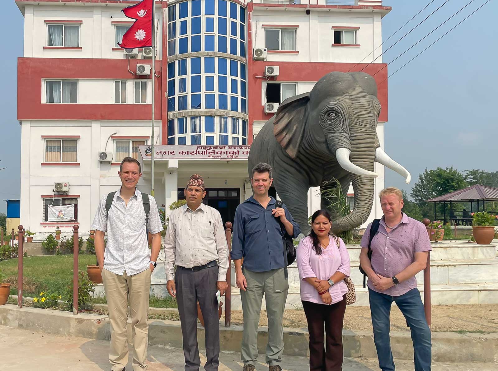 Global Solutions and NEVI project team outside Bharatpur Municipality office, Nepal, during GANESHA site visit, 2023.