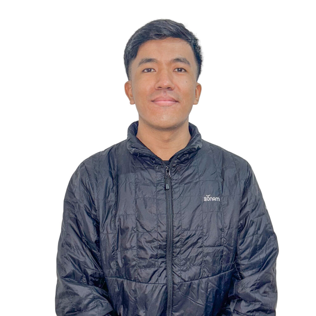 Pasang Temba Sherpa, NEVI - Electrical Engineer wearing a blue jacket