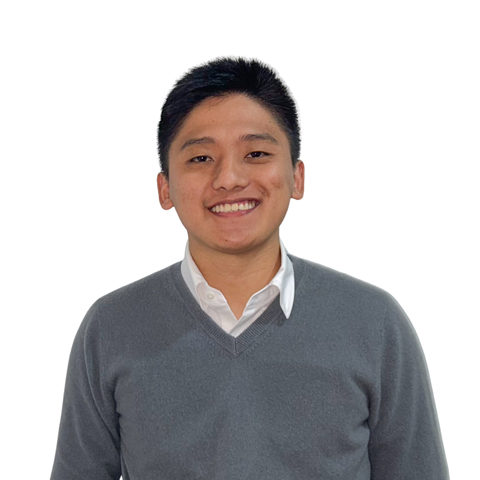 Tenphel Z Lama - Managing Director NEVI wearing a white shirt and light grey jumper