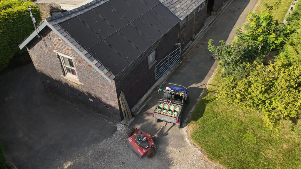 Polaris and mower leaving the barn ready to work the land at the UK Pilot Site.