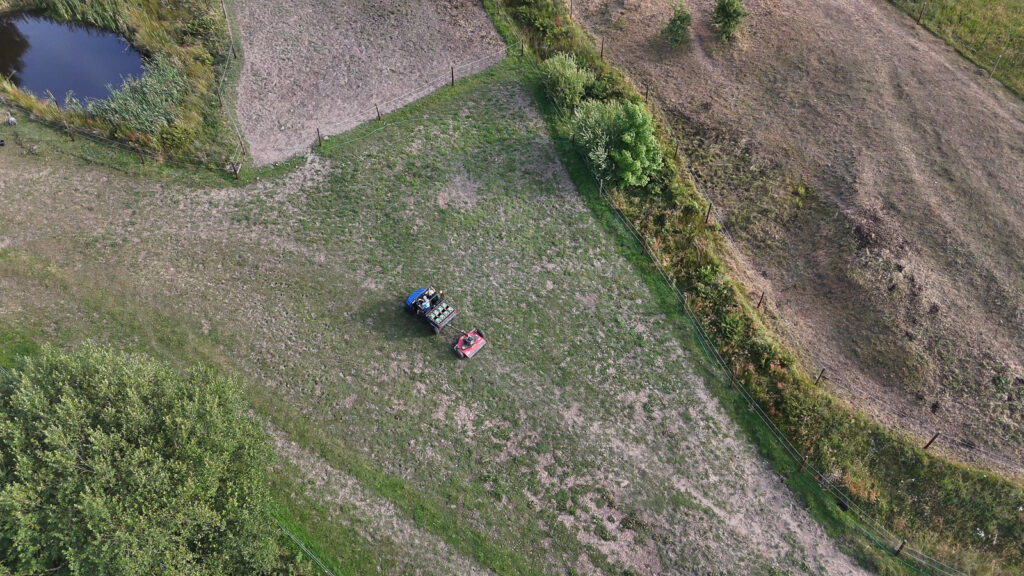 Overhead view of the Polaris and mower in the grounds at the UK pilot site.